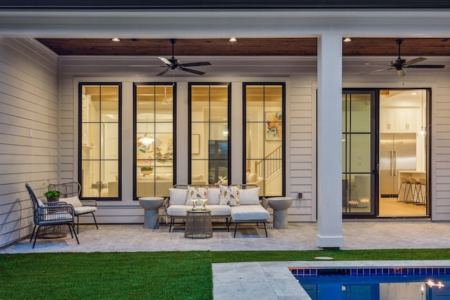 1310 Willard, Houston, TX 77006 - back of house featuring a ceiling fan, a patio, an outdoor living space, and an outdoor pool