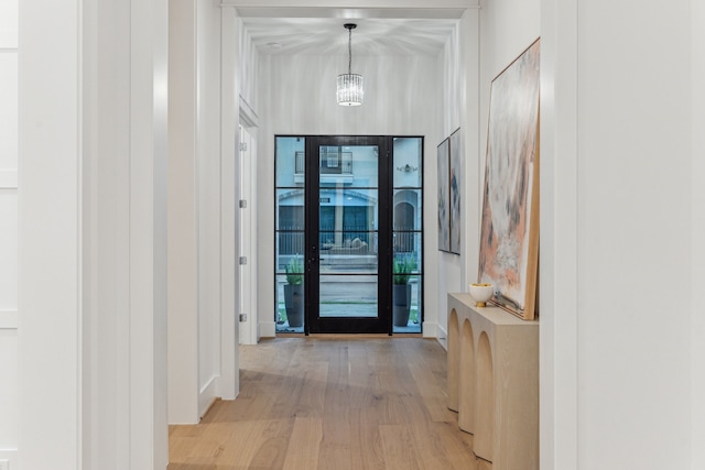 1310 Willard, Houston, TX 77006 - corridor featuring light wood finished floors and a chandelier