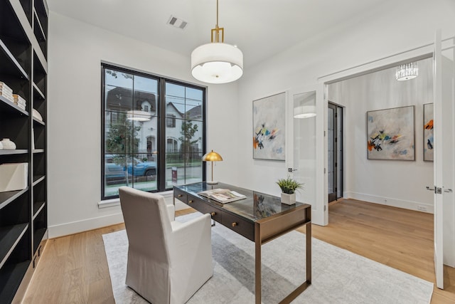 1310 Willard, Houston, TX 77006 - office area with wood finished floors and baseboards