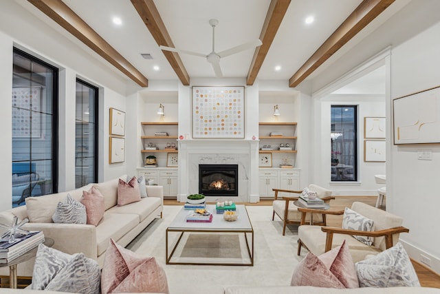 1310 Willard, Houston, TX 77006 - living room featuring beamed ceiling, a fireplace, light wood finished floors, recessed lighting, and built in features