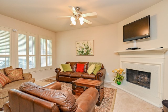 28123 Canyon Wren Dr, Katy, TX 77494 - living area with a ceiling fan, carpet, and a fireplace