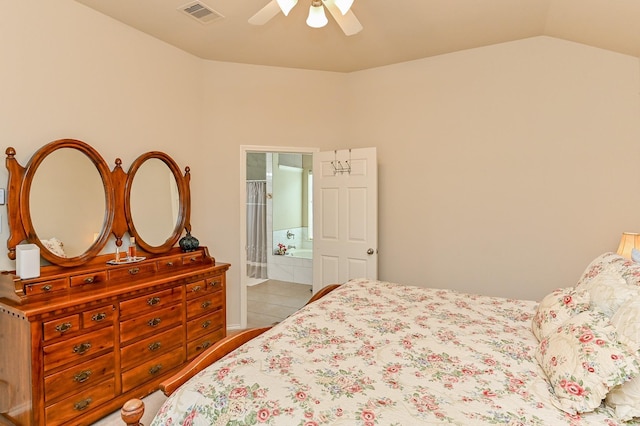 28123 Canyon Wren Dr, Katy, TX 77494 - bedroom with lofted ceiling, ceiling fan, ensuite bathroom, and light tile patterned floors