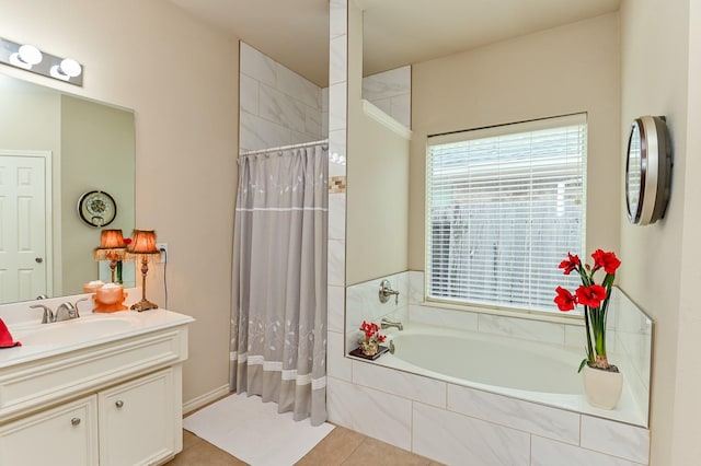 28123 Canyon Wren Dr, Katy, TX 77494 - bathroom featuring a garden tub, vanity, tile patterned floors, and a tile shower
