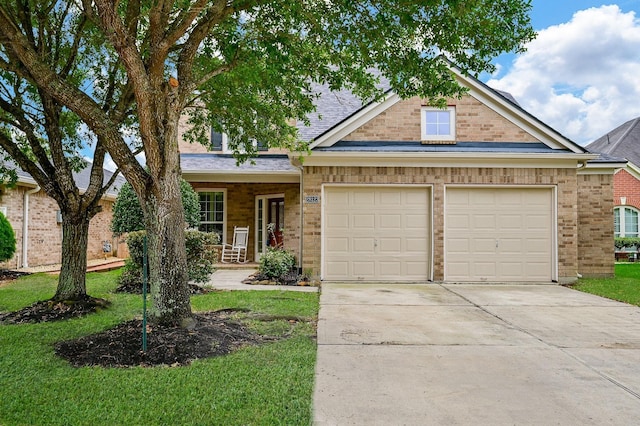 28123 Canyon Wren Dr, Katy, TX 77494 - view of front of property featuring an attached garage, brick siding, concrete driveway, a front yard, and a shingled roof