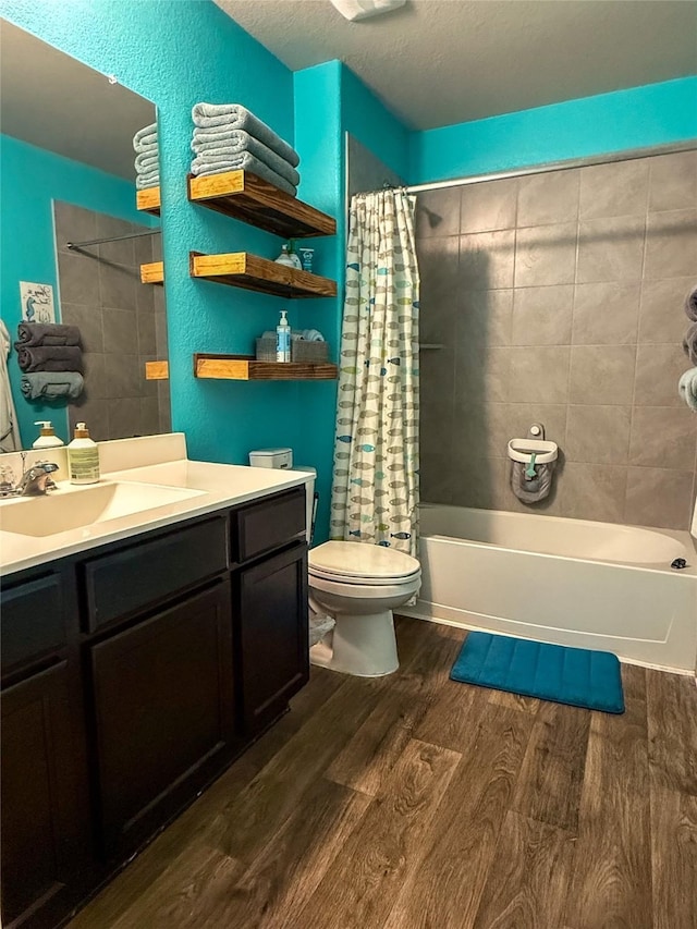 706 Zinnia Ct, Rosharon, TX 77583 - bathroom with wood finished floors, vanity, and shower / tub combo
