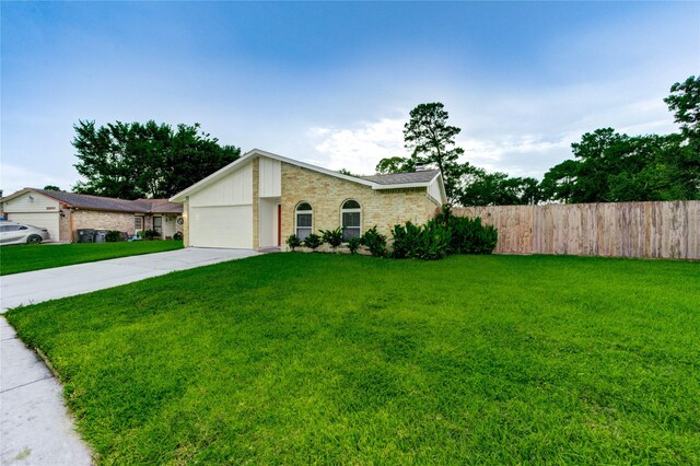 22843 Post Gate Dr, Spring, TX 77373 - view of front facade with driveway, brick siding, and an attached garage