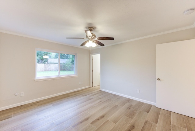 22843 Post Gate Dr, Spring, TX 77373 - spare room with light wood-type flooring, ornamental molding, ceiling fan, and a smoke detector