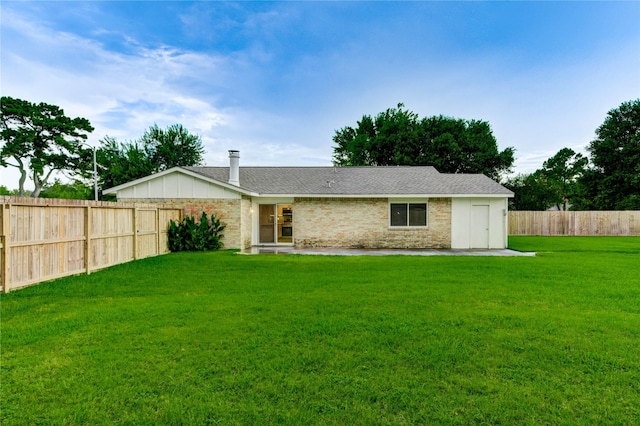 22843 Post Gate Dr, Spring, TX 77373 - rear view of house featuring a fenced backyard, a patio area, and brick siding