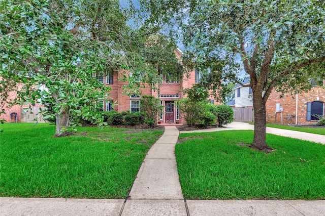 2605 Broussard Ct, Seabrook, TX 77586 - view of front of house with a front lawn and brick siding