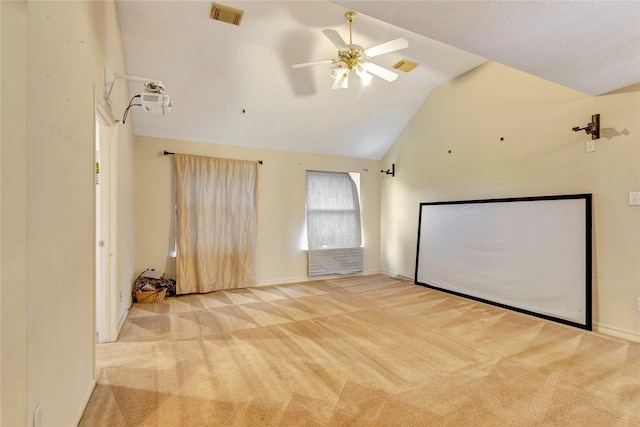2605 Broussard Ct, Seabrook, TX 77586 - carpeted empty room with vaulted ceiling and a ceiling fan