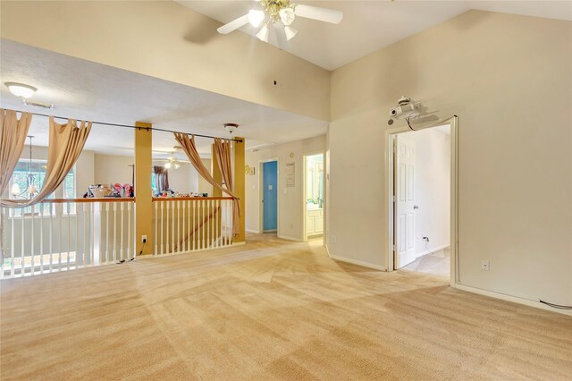 2605 Broussard Ct, Seabrook, TX 77586 - spare room with a ceiling fan, light carpet, and lofted ceiling
