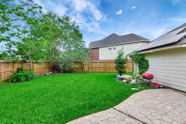 2605 Broussard Ct, Seabrook, TX 77586 - fenced backyard with a patio area