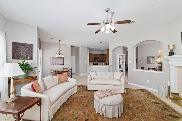 28035 Emma Gardens Ln, Spring, TX 77386 - living room with a ceiling fan and light tile patterned floors