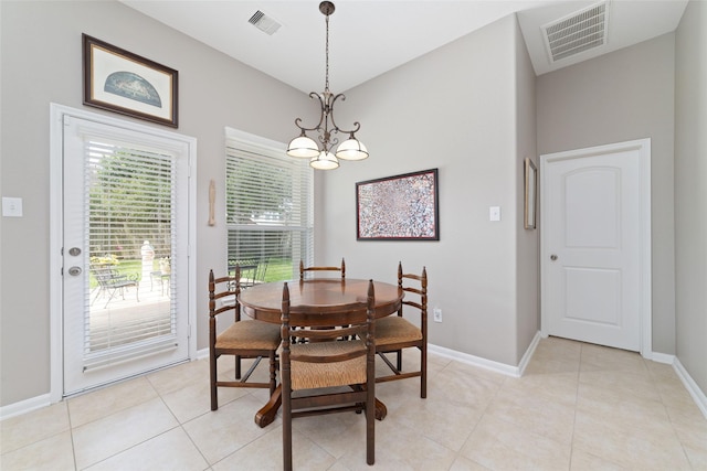 28035 Emma Gardens Ln, Spring, TX 77386 - dining room featuring a chandelier and light tile patterned floors