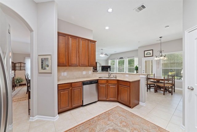 28035 Emma Gardens Ln, Spring, TX 77386 - kitchen with dishwasher, a peninsula, light tile patterned flooring, brown cabinetry, and recessed lighting