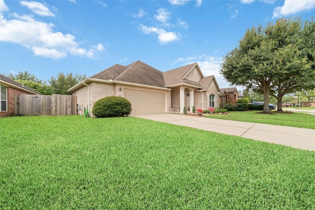28035 Emma Gardens Ln, Spring, TX 77386 - view of front facade featuring an attached garage, brick siding, concrete driveway, and a shingled roof