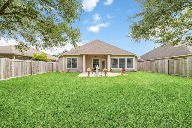 28035 Emma Gardens Ln, Spring, TX 77386 - back of property with a patio and a fenced backyard