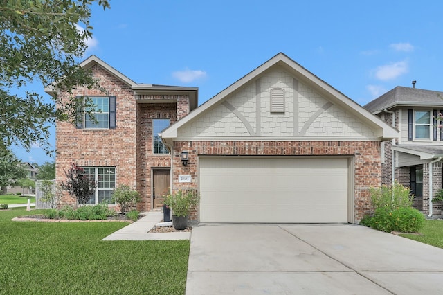 2803 Ridgecliff Ct, Conroe, TX 77301 - craftsman-style house featuring driveway, a front lawn, an attached garage, and brick siding