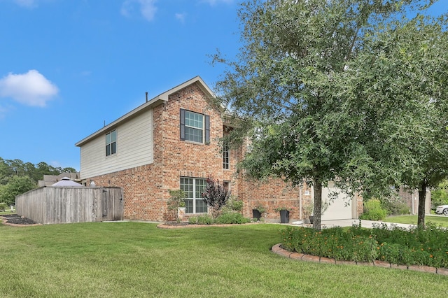 2803 Ridgecliff Ct, Conroe, TX 77301 - view of home's exterior with brick siding and a yard