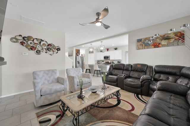 2803 Ridgecliff Ct, Conroe, TX 77301 - living area featuring ceiling fan and light tile patterned floors