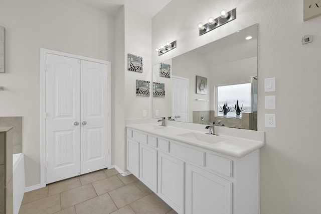 2803 Ridgecliff Ct, Conroe, TX 77301 - full bath with double vanity, tile patterned floors, and a bath