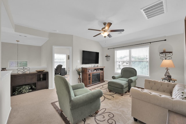 2803 Ridgecliff Ct, Conroe, TX 77301 - living area featuring ceiling fan, healthy amount of natural light, light carpet, and lofted ceiling