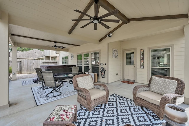 2803 Ridgecliff Ct, Conroe, TX 77301 - view of patio / terrace with a ceiling fan, a hot tub, and an outdoor hangout area