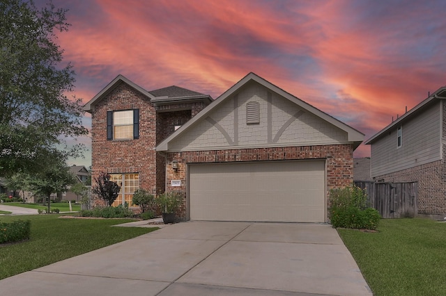 2803 Ridgecliff Ct, Conroe, TX 77301 - view of front of home featuring driveway, brick siding, and an attached garage