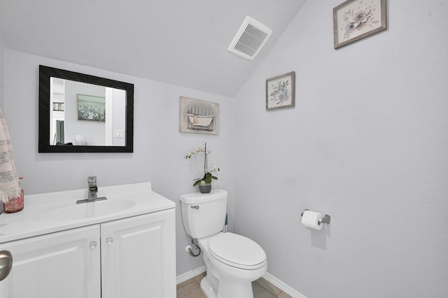 2803 Ridgecliff Ct, Conroe, TX 77301 - bathroom with lofted ceiling, vanity, and tile patterned floors