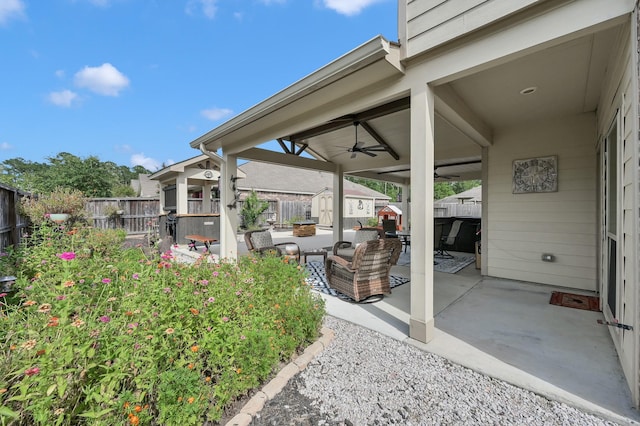 2803 Ridgecliff Ct, Conroe, TX 77301 - fenced backyard featuring a storage shed, a patio area, and a ceiling fan