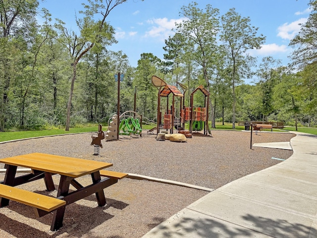 2803 Ridgecliff Ct, Conroe, TX 77301 - community playground featuring a forest view