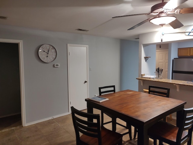 3125 Hells Gate Loop Unit 29, Strawn, TX 76475 - dining room with a ceiling fan and baseboards