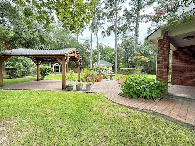 6107 Kyle Bend Ln, Katy, TX 77493 - view of grassy yard featuring a gazebo and a patio