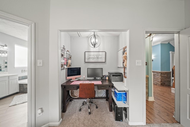 6107 Kyle Bend Ln, Katy, TX 77493 - office area featuring light wood-style floors and a chandelier