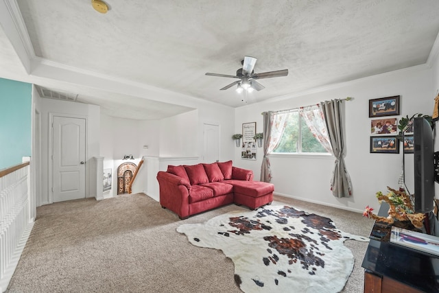 6107 Kyle Bend Ln, Katy, TX 77493 - living room featuring carpet flooring, ceiling fan, and a textured ceiling
