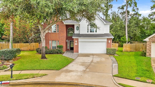 6107 Kyle Bend Ln, Katy, TX 77493 - traditional-style house featuring brick siding, a garage, driveway, and roof with shingles