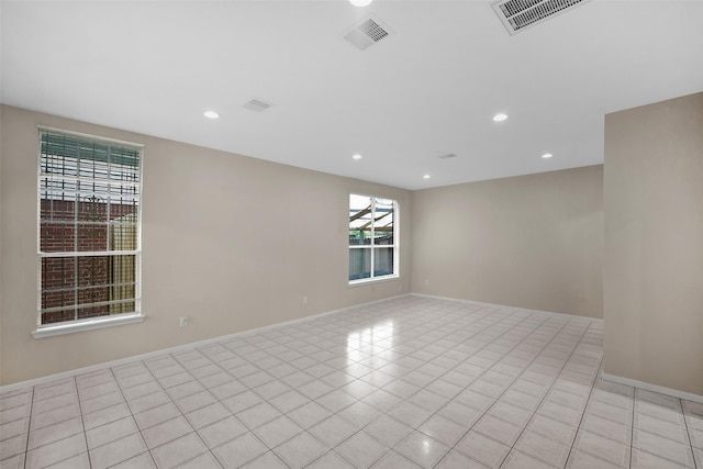13535 San Martin Ln, Houston, TX 77083 - empty room featuring recessed lighting and light tile patterned floors