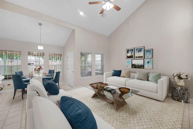 13535 San Martin Ln, Houston, TX 77083 - living room with high vaulted ceiling, light tile patterned floors, ceiling fan, and recessed lighting