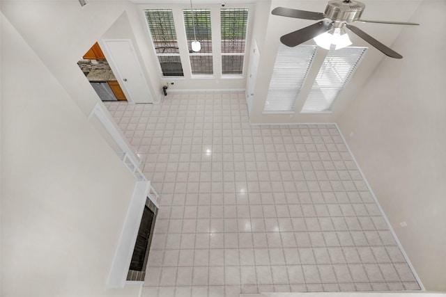 13535 San Martin Ln, Houston, TX 77083 - unfurnished living room with ceiling fan and baseboards