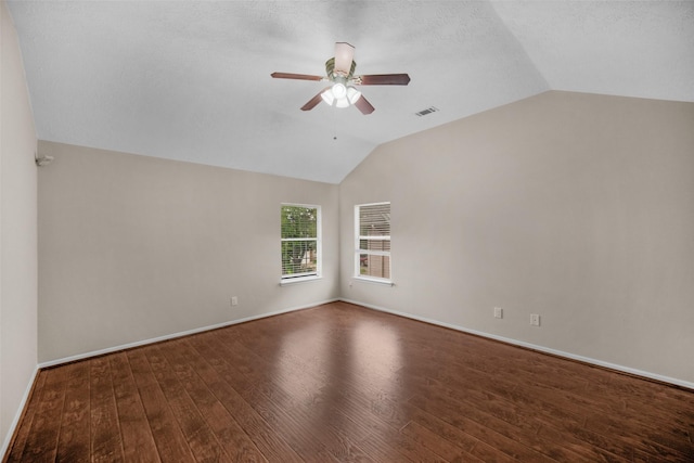 13535 San Martin Ln, Houston, TX 77083 - spare room featuring vaulted ceiling, ceiling fan, and wood finished floors