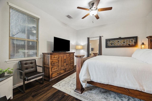 213 Lighthouse Bay Ln, League City, TX 77539 - bedroom with wood finished floors, multiple windows, and ceiling fan