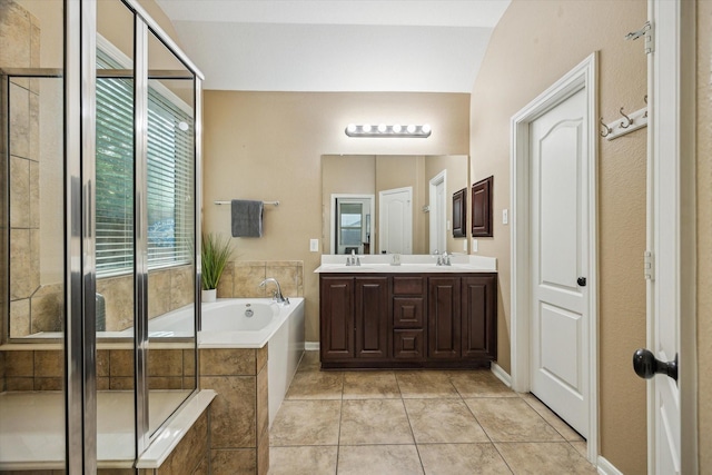 213 Lighthouse Bay Ln, League City, TX 77539 - full bath with double vanity, a garden tub, tile patterned flooring, and tiled shower