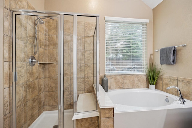 213 Lighthouse Bay Ln, League City, TX 77539 - full bath featuring a bath, a shower stall, and lofted ceiling