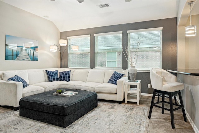 213 Lighthouse Bay Ln, League City, TX 77539 - living room featuring baseboards and vaulted ceiling