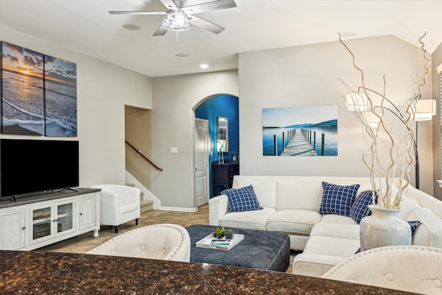 213 Lighthouse Bay Ln, League City, TX 77539 - living area with stairs, a ceiling fan, arched walkways, and recessed lighting