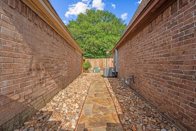 8411 Lylewood Ct, Houston, TX 77040 - view of side of property with a central air condition unit and brick siding