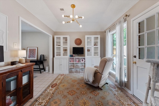 8411 Lylewood Ct, Houston, TX 77040 - living area featuring a chandelier, vaulted ceiling, and light tile patterned floors
