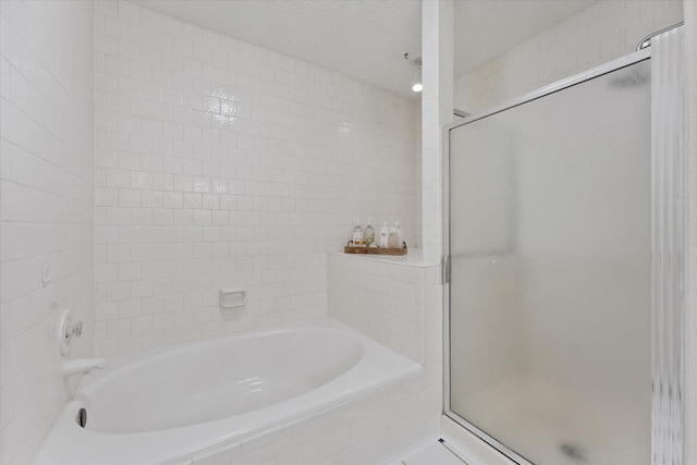 8411 Lylewood Ct, Houston, TX 77040 - bathroom with a stall shower and a bath