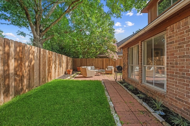 8411 Lylewood Ct, Houston, TX 77040 - fenced backyard featuring an outdoor hangout area and a patio