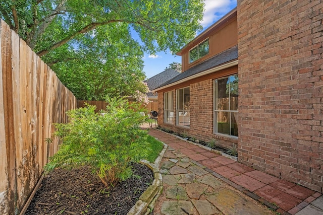 8411 Lylewood Ct, Houston, TX 77040 - fenced backyard with a patio area